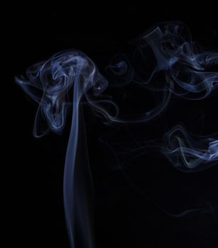 Abstract colored smoke closeup shot as the backdrop for the holidays