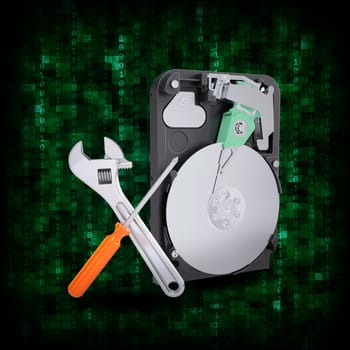 Abstract background. HDD with magnifying glass and adjustable wrench. Electronic concept