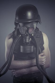 Smoke, Man with black gas mask, pollution concept and ecological disaster
