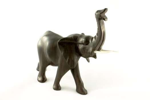figure wooden elephant on white background