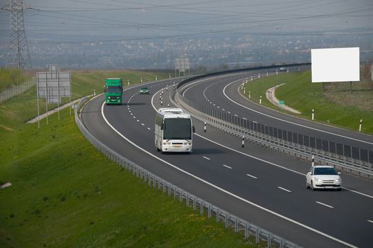 Highway with cars passing by