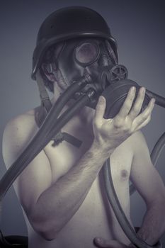 Nuclear, Man with black gas mask, pollution concept and ecological disaster