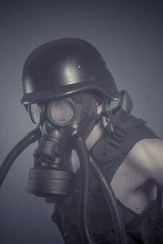 Factory, Man with black gas mask, pollution concept and ecological disaster