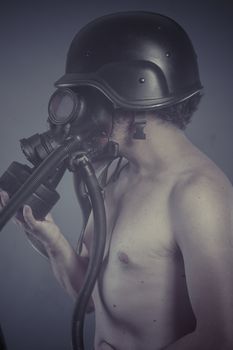 Man with black gas mask, pollution concept and ecological disaster