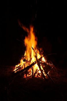 Camp fire burning in the night