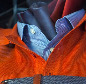 Close up of men's clothes, pullover shirt and necktie