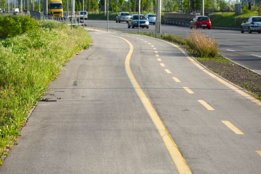 Bicycle lane sign on asphalt surface