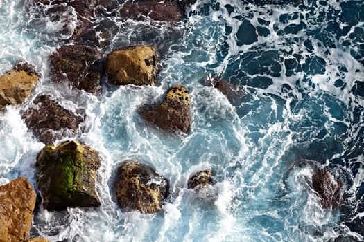 Waves hitting the sea shore