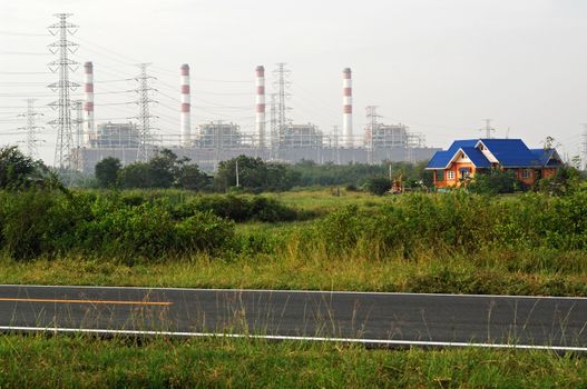 House and electricity towers