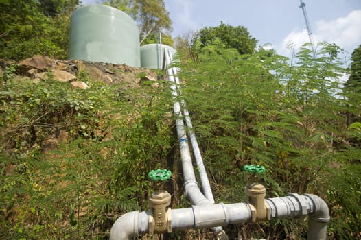 Water pipes and tanks in the mountain