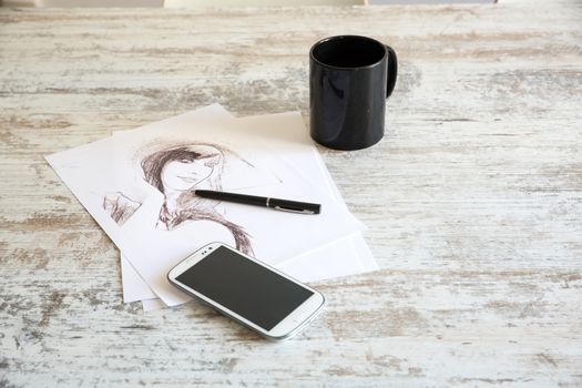 Drawing a sketch on the Table.