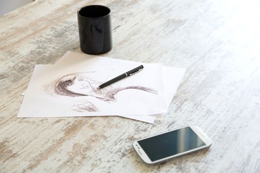 Drawing a sketch on the Table.