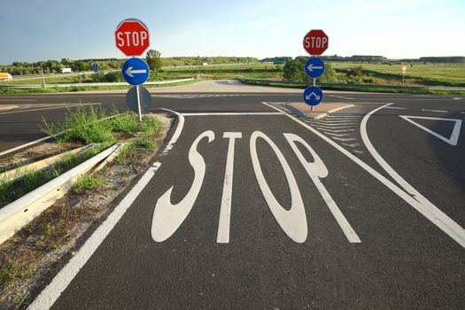 Stop sign painted on the road