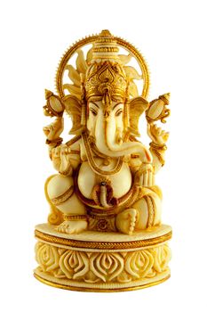 Isolated Marble Statue of the Elephant Headed Hindu God Ganapathi sitting on a Pedestal.