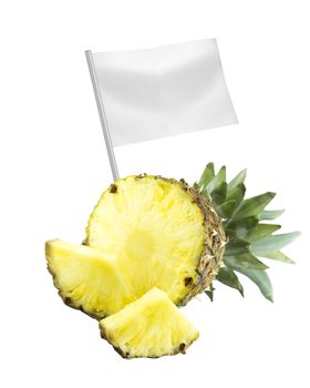 Healthy and organic food concept. Fresh Ripe pineapple with flag showing the benefits or the price of fruits.