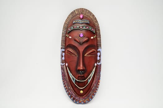 Wooden African Mask on a White Background