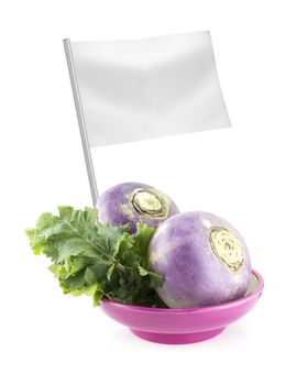 Healthy and organic food concept. Fresh purple headed turnips with flag showing the benefits or the price of fruits.