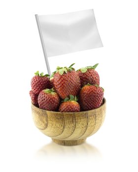 Healthy and organic food concept. Fresh Strawberries with flag showing the benefits or the price of fruits.