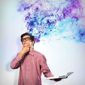 image of a young man with a book, a creative mind