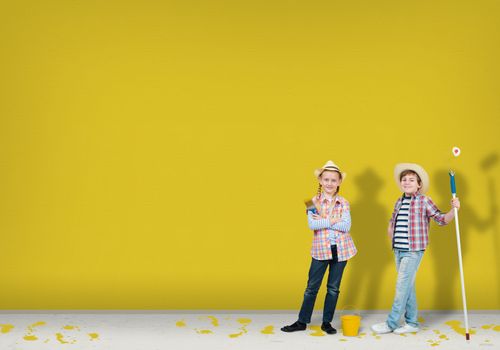 image of a children finished painting the wall