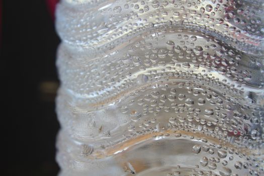 Water Drops on plastic bottle, background and texture