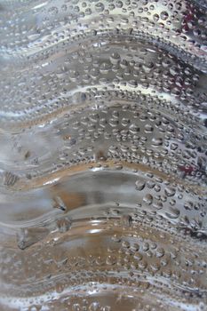 Water Drops on plastic bottle, background and texture