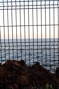 Net over the atlantic ocean at sunset