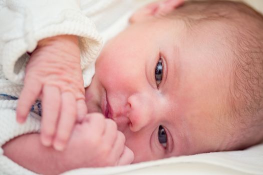 looking with openet eyes newborn baby in the hospital - the first hours of the new life