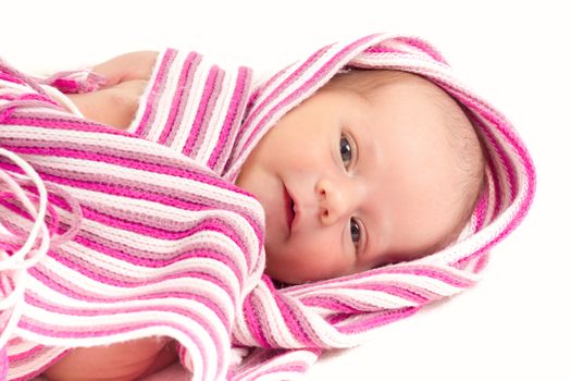 watching newborn baby in shawl on white blanket - the first week of the new life