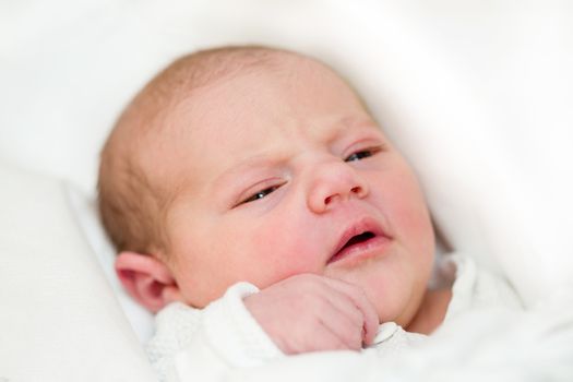 looking with openet eyes newborn baby in the hospital - the first hours of the new life