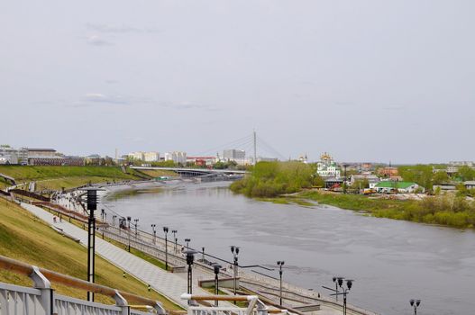 The embankment in Tyumen. Spring flood of the Tura River.