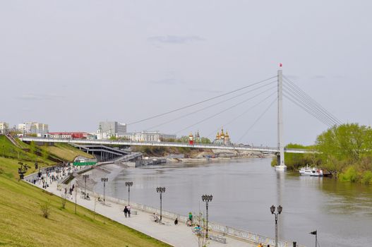 The embankment in Tyumen. Spring flood of the Tura River.