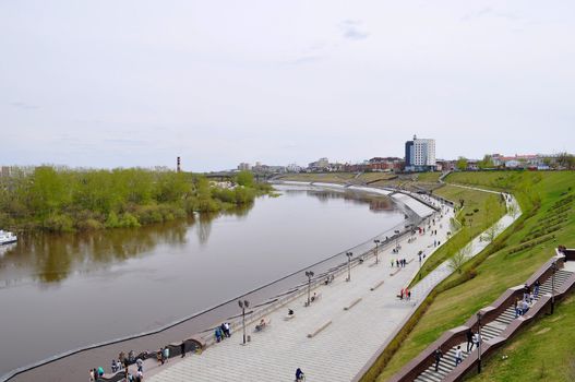 The embankment in Tyumen. Spring flood of the Tura River
