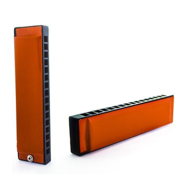 Orange Harmonica On a White background