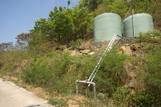 Water pipes and tanks in the mountain