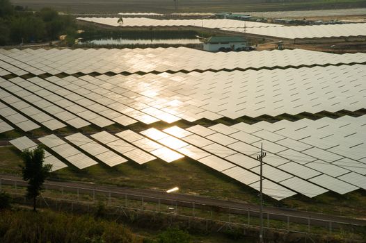 Solar cell panel in sunset from aerial view