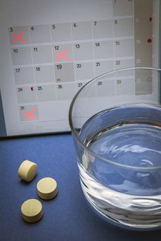 control pills on a calendar 