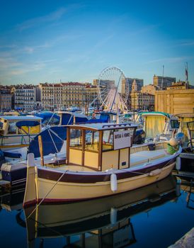 A Boat For Sale In Marseille Harbor At Dusk