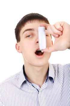 Teenager using Inhaler Isolated on the White Background