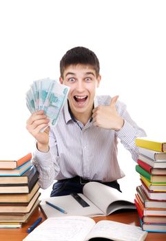 Happy Student with Russian Currency at the School Desk on the white background