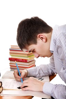 Student preparing for Exam at the School Desk