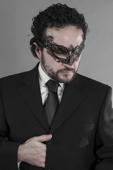 Sexy and mysterious businessman with mask