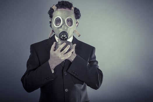 Apocalypse, Business man wearing a gask mask, pollution concept