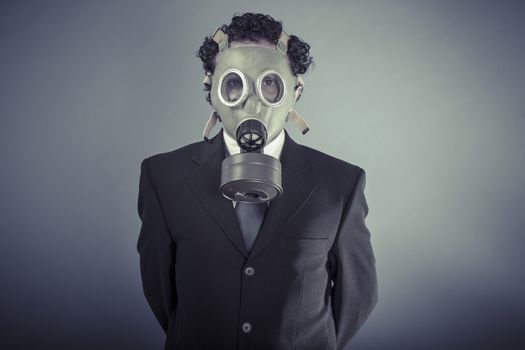Hazard, Business man wearing a gask mask, pollution concept