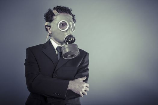 Nuclear, Business man wearing a gask mask, pollution concept