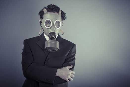 Environment, Business man wearing a gask mask, pollution concept