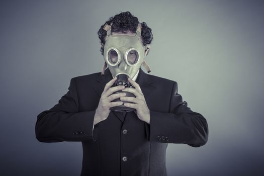 Disaster, Business man wearing a gask mask, pollution concept