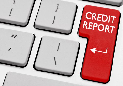 Credit report printed on a computer key