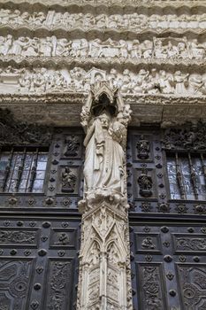 side entrance of the Cathedral of Toledo, arc with religious reliefs