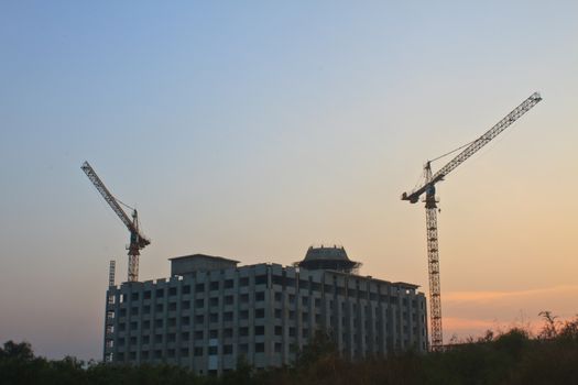 Construction site on sunset background